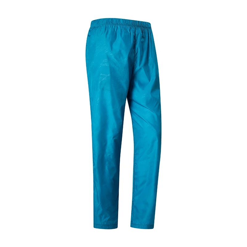 Stylish blue women's polyester track pants with elastic waist, designed for outdoor campers and hikers. Water-resistant, quick-drying.
